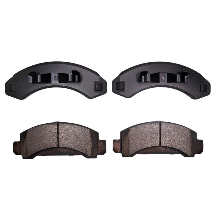 The BFD249SM ProSeries OE Brake Pads set includes four brake pads: two brand-new ones featuring smooth surfaces on top, and two worn ones with rough surfaces on the bottom.