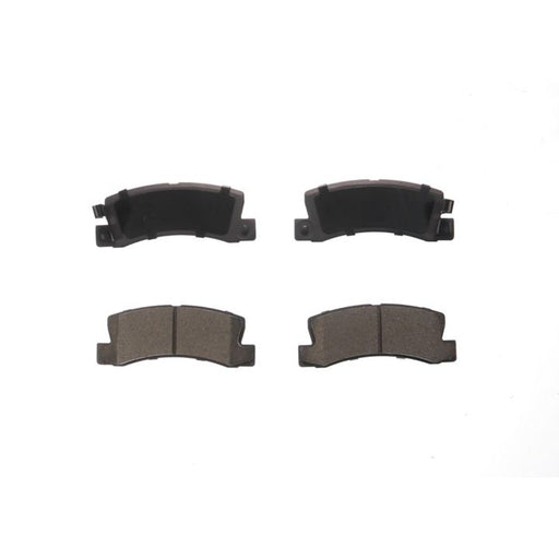 Four BFD325CR ProSeries OE Brake Pads, with two facing up revealing the pad material and two facing down showing the metal backing plate.