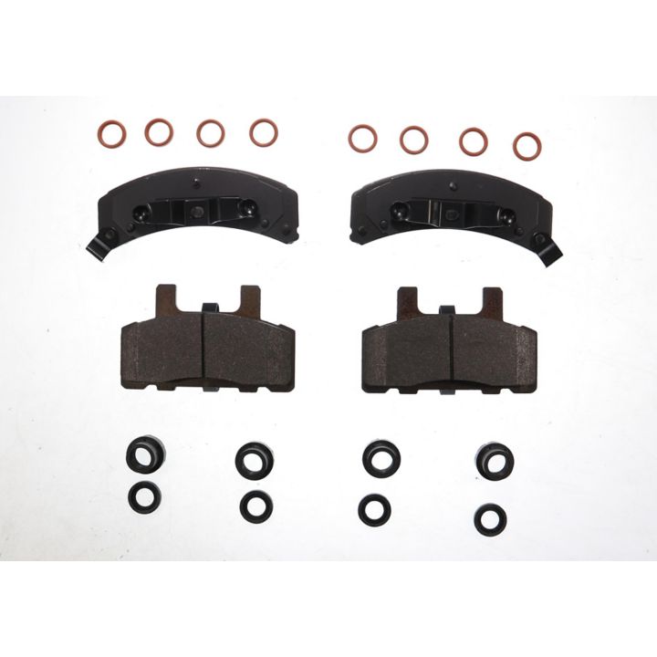 Top and back views of the BFD369SM ProSeries OE Brake Pads, accompanied by washers and rings arranged around them on a white background.