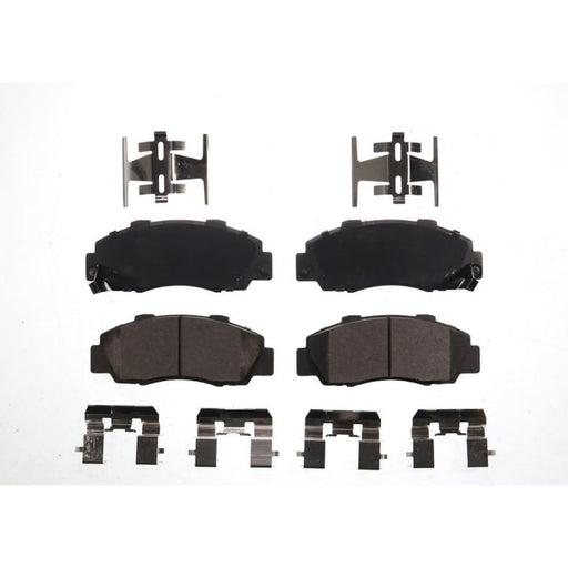 Set of four BFD503CR ProSeries OE Brake Pads in black, along with accompanying metal hardware, displayed on a white background.