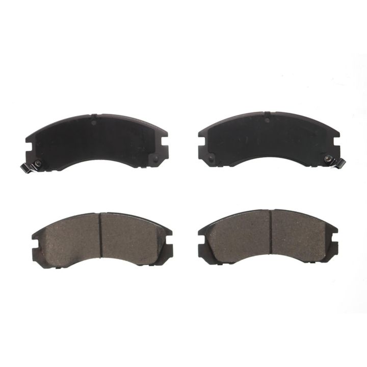 Four BFD530CR ProSeries OE Brake Pads, two displaying the metal backing and two displaying the friction material side, arranged in a grid.