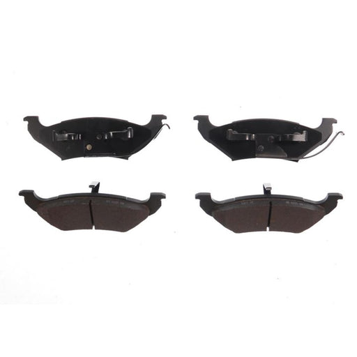 Four BFD715SM ProSeries OE Brake Pads in black, with two featuring metal clips on the top row and the other two having friction surfaces on the bottom row.
