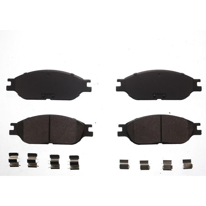 Four BFD803SM ProSeries OE Brake Pads with hardware clips arranged on a white background.
