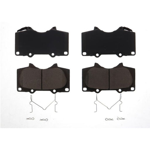 A set of four BFD976CR ProSeries OE Brake Pads with metal clips, arranged on a white background.