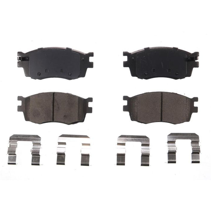 Four BFD1156CR ProSeries OE Brake Pads and four brake pad clips arranged in two rows on a white background.