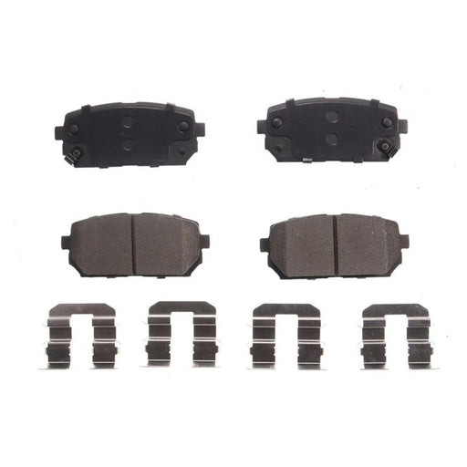 A set of four BFD1296CR ProSeries OE Brake Pads with accompanying metal clips arranged on a white background.