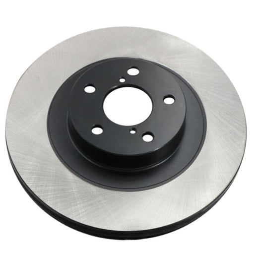A close-up image of the C26174 ProSeries OE+ Brake Rotor, showcasing its black center and silver outer surface.