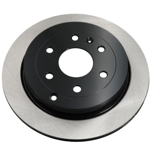 A close-up of the C26503 ProSeries OE+ Brake Rotor featuring multiple holes designed for installation in an automotive braking system.