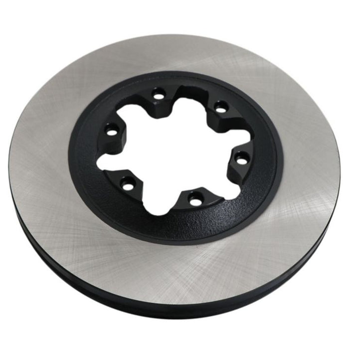 The C26137 ProSeries OE+ Brake Rotor is a vented brake rotor with a black center and a metallic outer edge, featuring a star-shaped central opening with bolt holes.