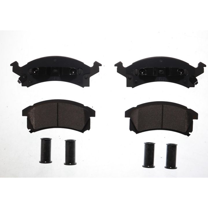 Four BFD673SM ProSeries OE Brake Pads and four cylindrical components arranged on a white background.