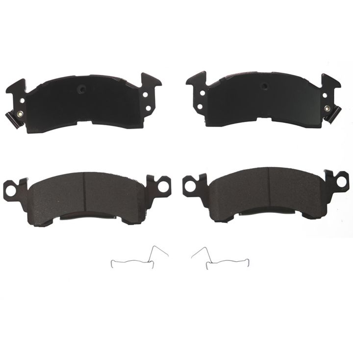 Four BFD52CR ProSeries OE Brake Pads in black, arranged in two rows with metal clips underneath each pair, displayed on a white background.