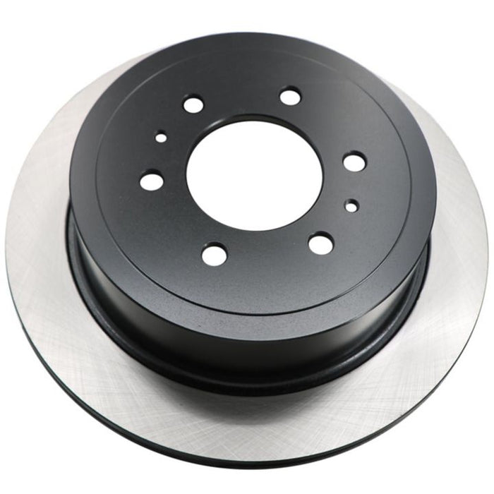 A top-down view of the C26110 PRO-SERIES OEPLUS Brake Rotor, featuring a black center and a silver edge.