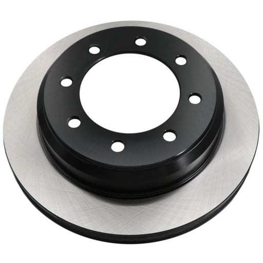 A C26468 ProSeries OE+ Brake Rotor in black and silver with drilled holes on a white background.