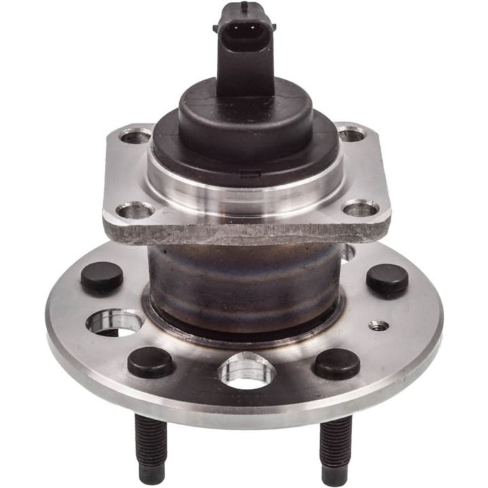 The PS512003 ProSeries OE Hub Bearing Assembly features a car wheel hub assembly with multiple bolts, metal finishes, and a black plastic sensor component attached on top.