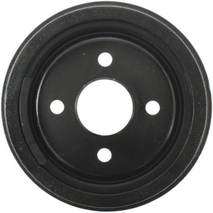 A black, circular 8987 Pro-Series OE Brake Drum made of metal, featuring a large central hole and four smaller surrounding holes.