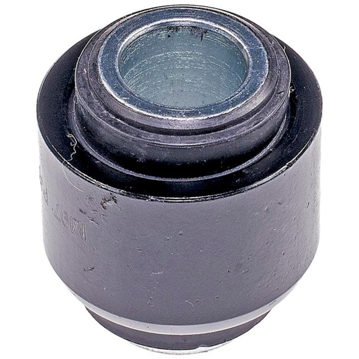 Close-up of a BJ85520 NASCAR Advantage Ball Joint - Rear, featuring a metallic cylindrical bushing with a hollow center and dark outer surface.