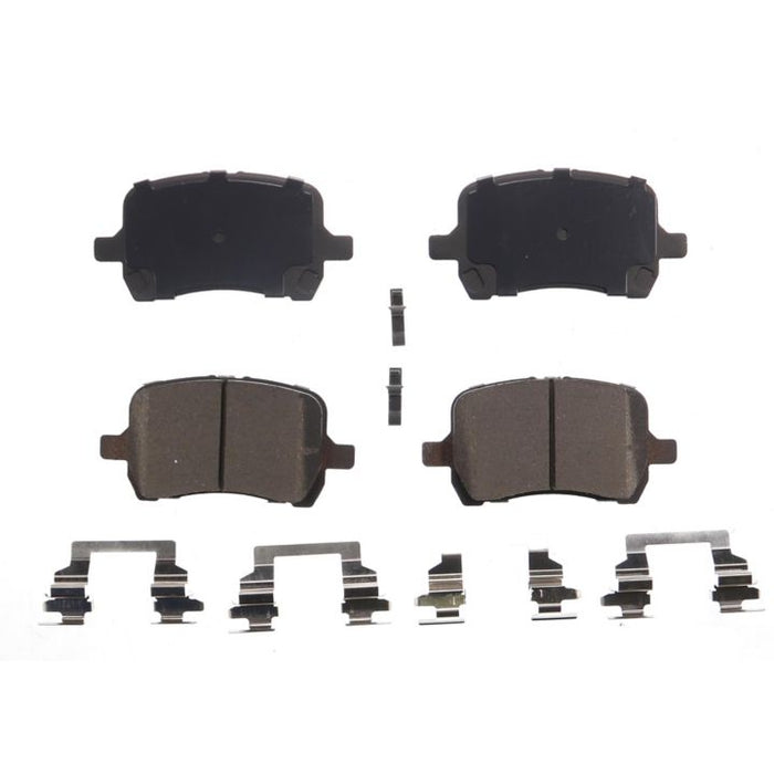 A set of four BFD1160CR ProSeries OE Brake Pads with metal clips arranged on a white background.