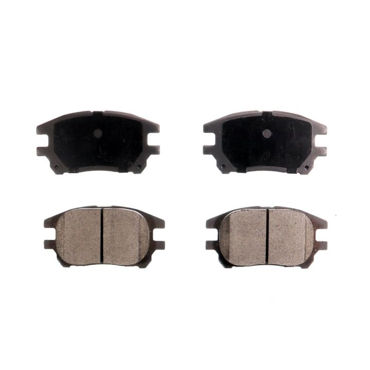 Set of four BFD930CR ProSeries OE Brake Pads, featuring two with friction material visible and two with metallic backing plates facing up.