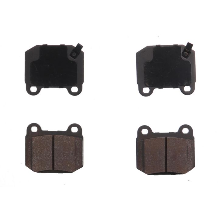 Four BFD961CR ProSeries OE Brake Pads in black, arranged in two rows of two, with the bottom pads displaying worn friction surfaces.