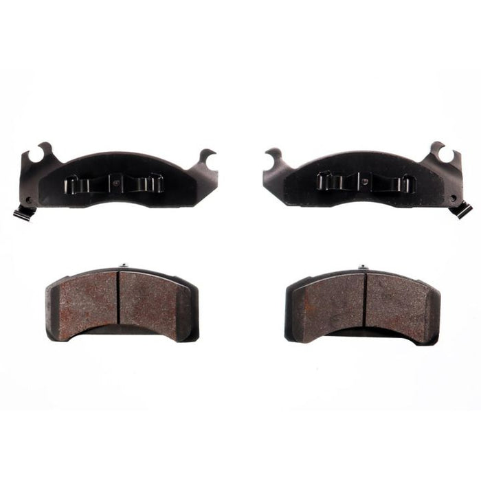 Front and back view of two worn BFD310CR ProSeries OE black brake pads with metal clips, isolated on a white background.