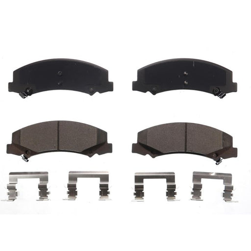 Set of four BFD1159CR ProSeries OE Brake Pads with metal clips arranged below them on a white background.