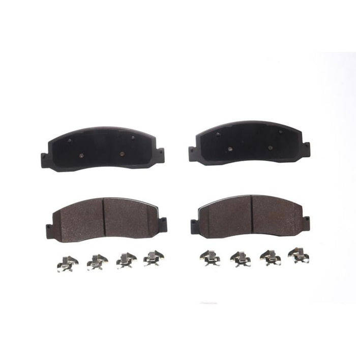 A set of four BFD1333SM ProSeries OE brake pads with accompanying metal clips, displayed on a plain white background.