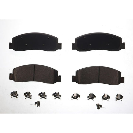 Four BFD1333ASM ProSeries OE black brake pads and eight small metal clips arranged on a white background.