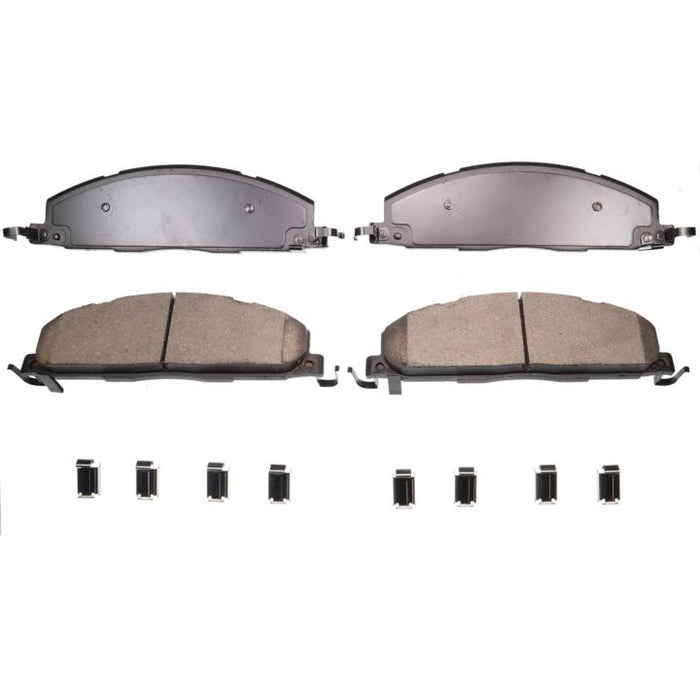 Four BFD1400SM ProSeries OE Brake Pads with accompanying metal clips arranged in a row below them.