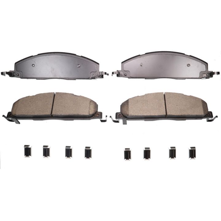 Four BFD1400SM ProSeries OE Brake Pads with accompanying metal clips arranged in a row below them.