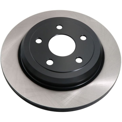 A close-up image of the C07114 ProSeries OE+ Brake Rotor, featuring a metallic finish, a black center, and holes for mounting.