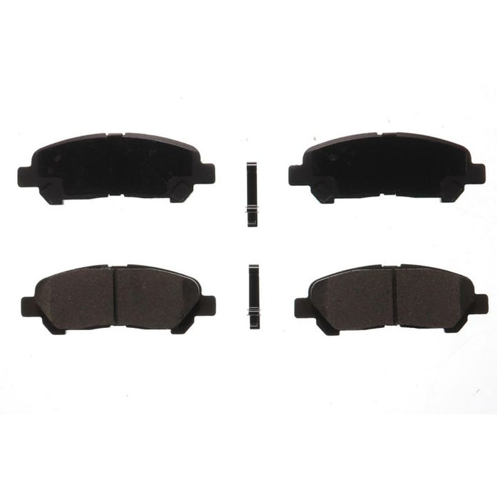 Four BFD1325CR ProSeries OE black brake pads with metal clips on a white background.