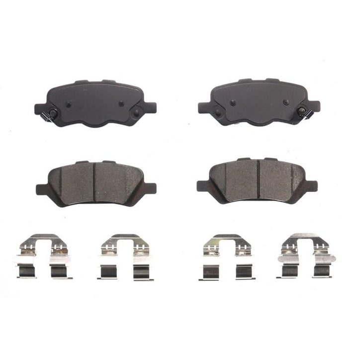 A set of BFD1402CR ProSeries OE Brake Pads, featuring four brake pads and four clips, arranged in two rows on a white background.