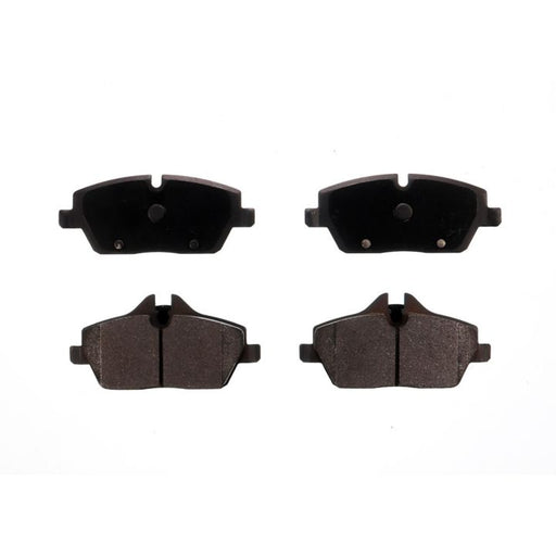 Four BFD1308SM ProSeries OE Brake Pads, worn out and black, arranged on a white background.