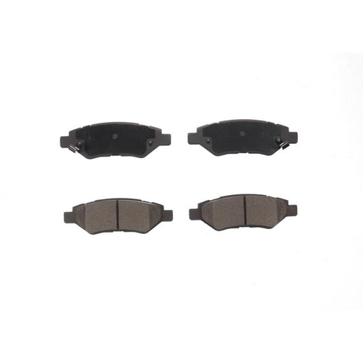 Set of four BFD1337CR ProSeries OE Brake Pads, two with visible friction material and two showing the back plates, isolated on a white background.