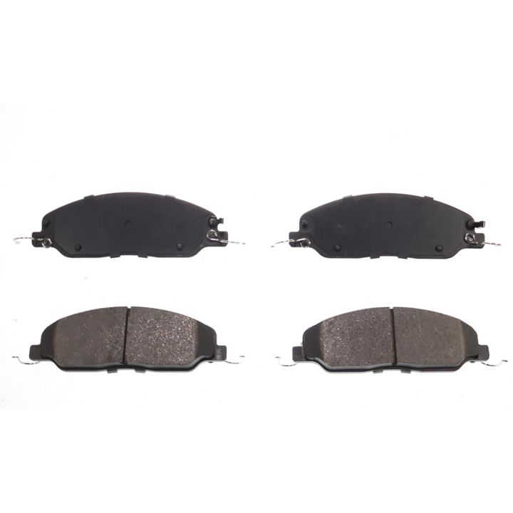 Four BFD1464CR ProSeries OE Brake Pads in black, featuring two with smooth surfaces and two with textured surfaces, arranged in pairs.
