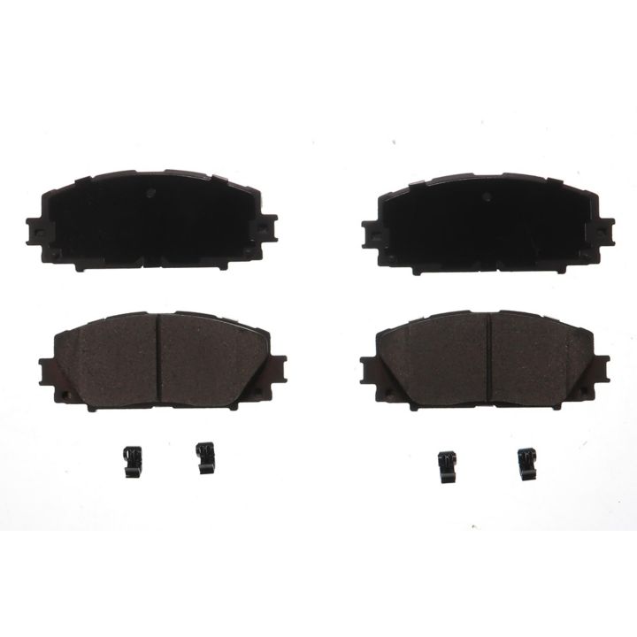 Four BFD1184ACR ProSeries OE Brake Pads in black and two clips are arranged symmetrically on a white background.