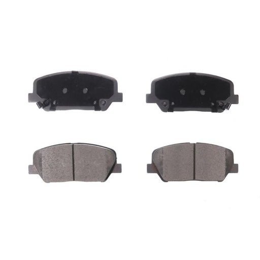 Set of four BFD1413CR ProSeries OE Brake Pads, two facing front and two showing the rear side, against a white background.