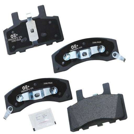 Four MMS370 ProSeries OE+ Brake Pads with metal clips displayed alongside a small white packet on a white background.