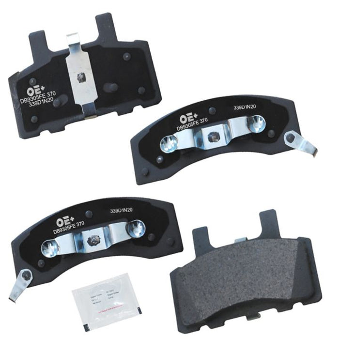 Four MMS370 ProSeries OE+ Brake Pads with metal clips displayed alongside a small white packet on a white background.
