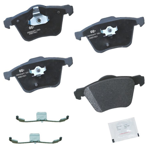 The MMS1003 ProSeries OE+ Brake Pads set, including four black brake pads, two brake pad clips, and a small packet of grease, arranged on a white background.