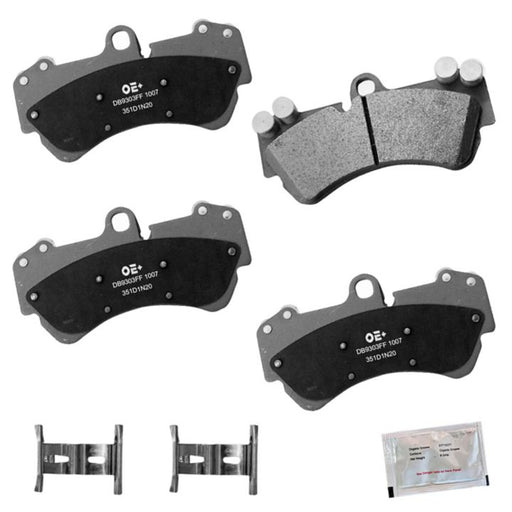 The MMS1007 ProSeries OE+ Brake Pads, consisting of four brake pads, two metal clips, and a packet labeled "grease," are arranged on a white background.