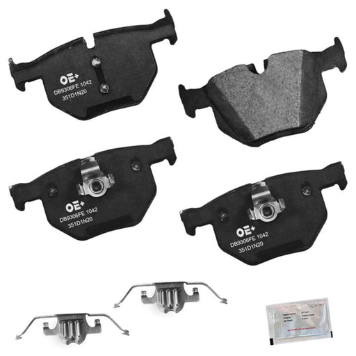 A set of MMS1042 ProSeries OE+ Brake Pads, consisting of four black brake pads, two metallic clips, and a small packet of brake lubricant, displayed on a white background.