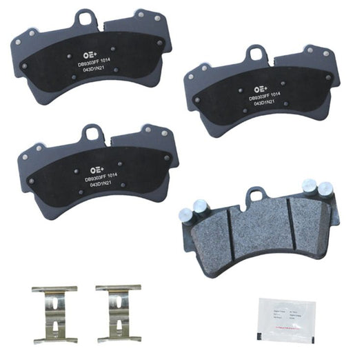 A set of four MMS1014 ProSeries OE+ Brake Pads in black, complete with accessories including clips and a small packet of grease.