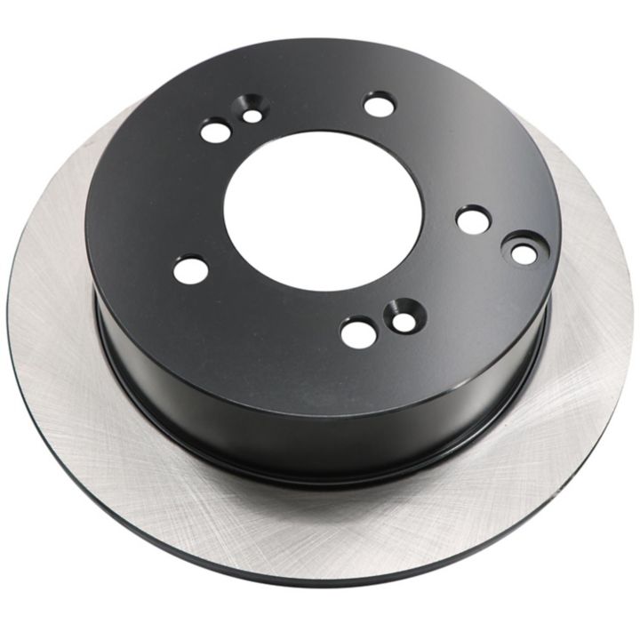 A black and silver C26252 ProSeries OE+ Brake Rotor featuring multiple holes, viewed from an angle on a white background.
