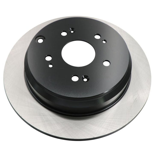 The C26352 ProSeries OE+ Brake Rotor is a black and silver car brake rotor featuring multiple holes for ventilation and mounting.