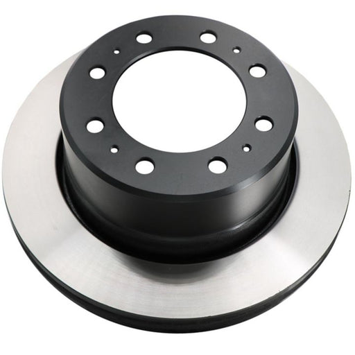 Close-up of the C80310 ProSeries OE+ Brake Rotor, featuring a metallic design with multiple holes around the center, on a white background.