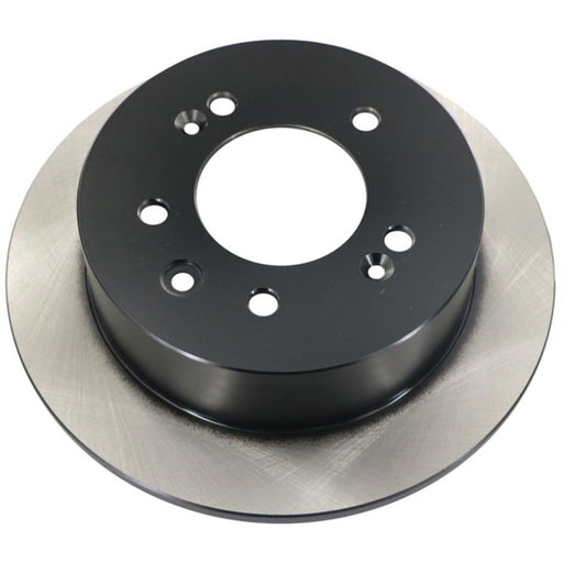 The C80016 ProSeries OE+ Brake Rotor is a circular car brake rotor with a black center and silver outer edge, featuring multiple mounting holes.