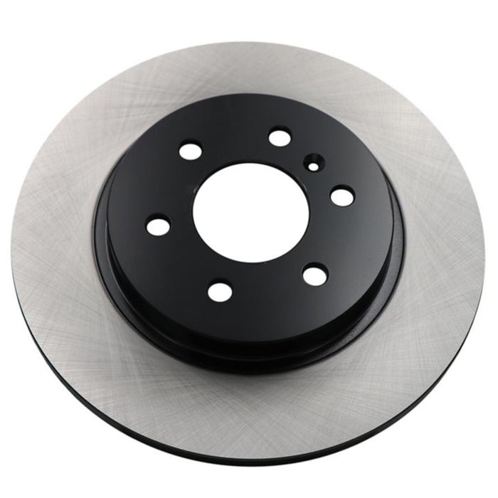 A single C26501 ProSeries OE+ Brake Rotor featuring a black central hub and a silver outer ring, designed for vehicle braking systems.