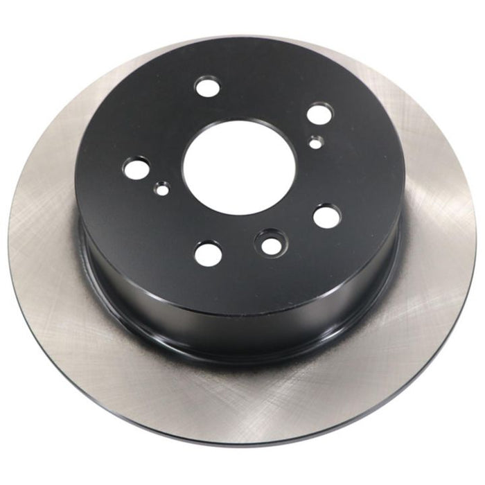 The C80494 ProSeries OE+ Brake Rotor, featuring a metallic construction and multiple holes for mounting.