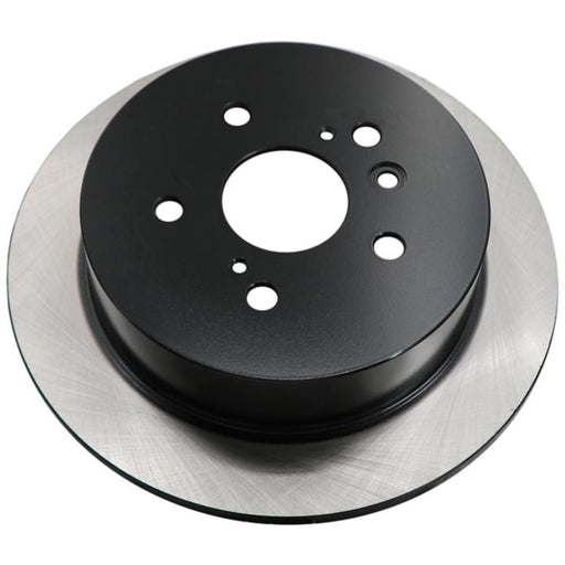 Close-up of the C26185 ProSeries OE+ Brake Rotor, showcasing a black center and silver outer edge with multiple mounting holes.